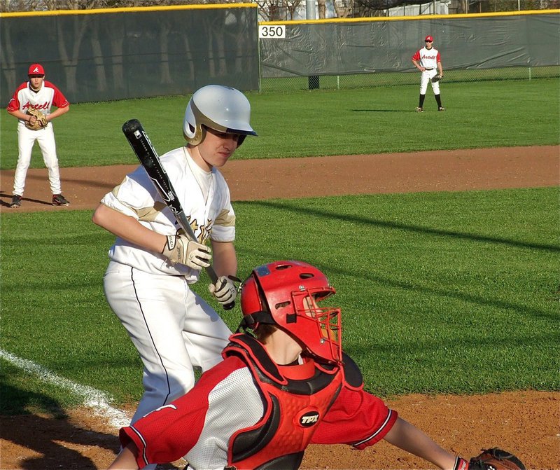 Image: Italy’s John Escamilla lays off an outside pitch.