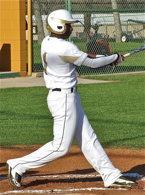 Image: Marvin Cox(1) launches a crowd amazer over the left field fence for a 350 foot out-of-the-park homerun!