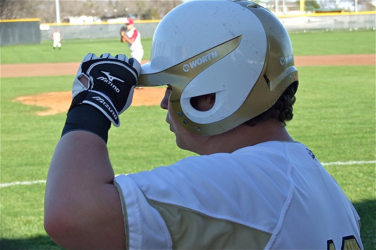 Image: Just another game at the office for power hitter John Byers(12) who enjoys whistling while he works.