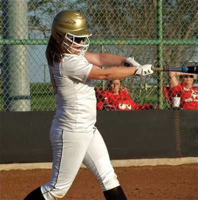 Image: Sophomore slugger Paige Westbrook(10) connects for a hit against Axtell.
