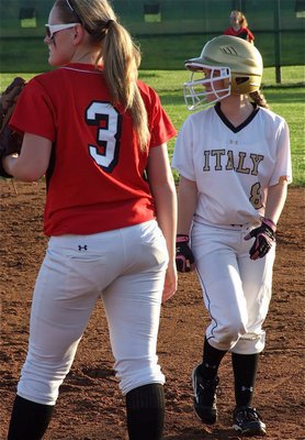 Image: Freshman Tara Wallis(8) tries to sneak away to second base.