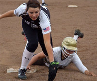 Image: Italy’s Alyssa Richards avoids being thrown out at first base and then steals second after an error by the Lady Zebras.