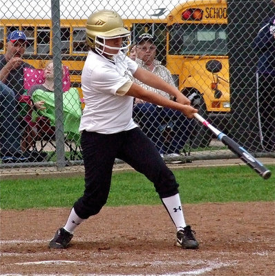 Image: Italy’s Alma Suaste digs one out for a single.