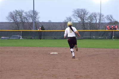 Image: Alyssa Richards(9) rounds secound base after hitting an over-the-fence homerun over Grandview’s left field fence.