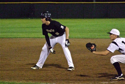 Image: Junior Cole Hopkins(9) extends his lead from first base.