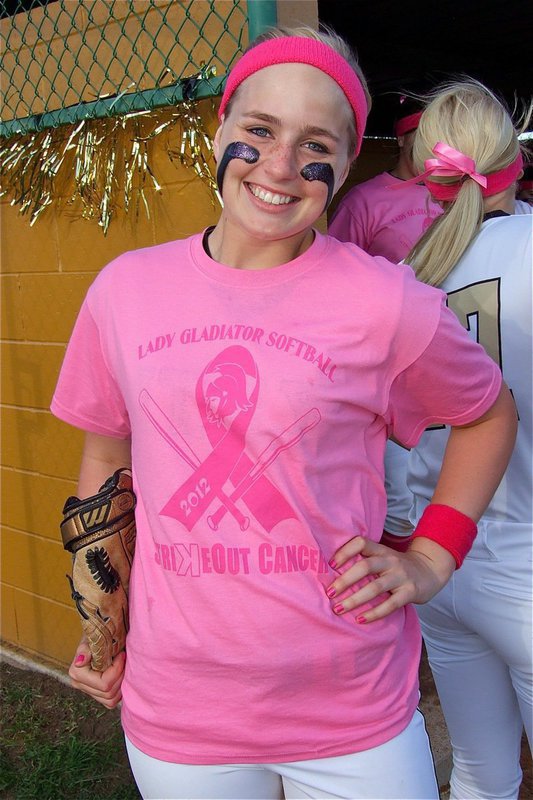 Image: Freshman Madison Washington sports her Lady Gladiator Softball 2012 Strikeout Cancer shirt before the game against Maypearl.