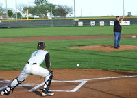 Image: Gladiator Fan of the Year, Richard Cook throws the opening pitch.
