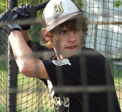 Image: Sophomore Gladiator Justin Wood gets practice time inside the batting cage before Italy’s game against Clifton.