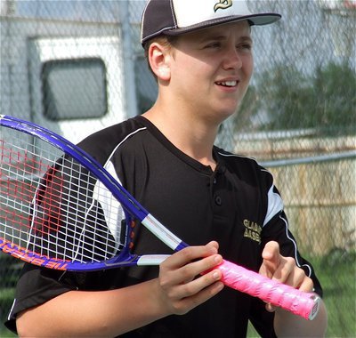 Image: Bailey Walton claims the secret to his success is the pink duck tape adorning the handle of the racket he borrowed from teammate Zain Byers.