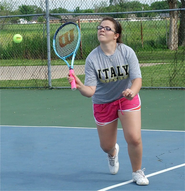 Image: Hitting her groove, Reagan Adams, surprised everyone with her natural tennis skills during a practice session between Italy Tennis and St. Joseph of Waxahachie.