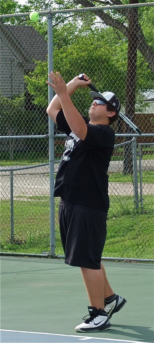 Image: Italy’s Kevin Roldan launches an offensive attack serving up the slice shot of the day.