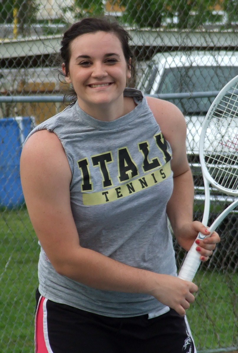 Image: Taking time to smile at the camera while awaiting the serve is Kaytlyn Bales.