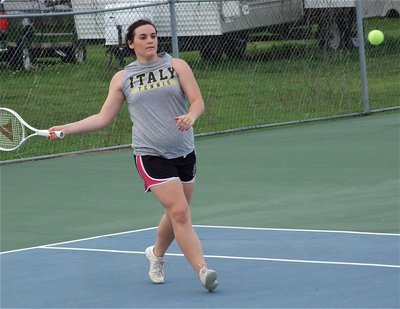 Image: With a confident forehand, Kaytlyn Bales attacks the ball.