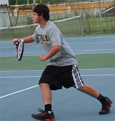 Image: Kyle Fortenberry gets some extra reps in during a singles match with teammate, Brandon Souder.
