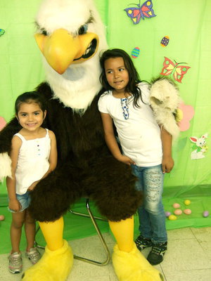 Image: Luty Ledesso and Brianna Martina pose with the Eagle mascot for a great photo.