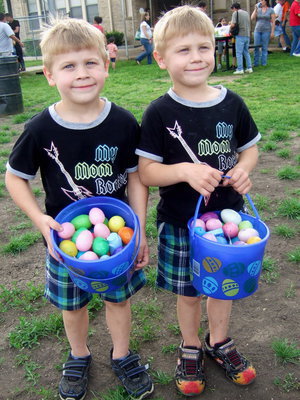 Image: Jake and Zachary Ozymy are proud of all the eggs they found.