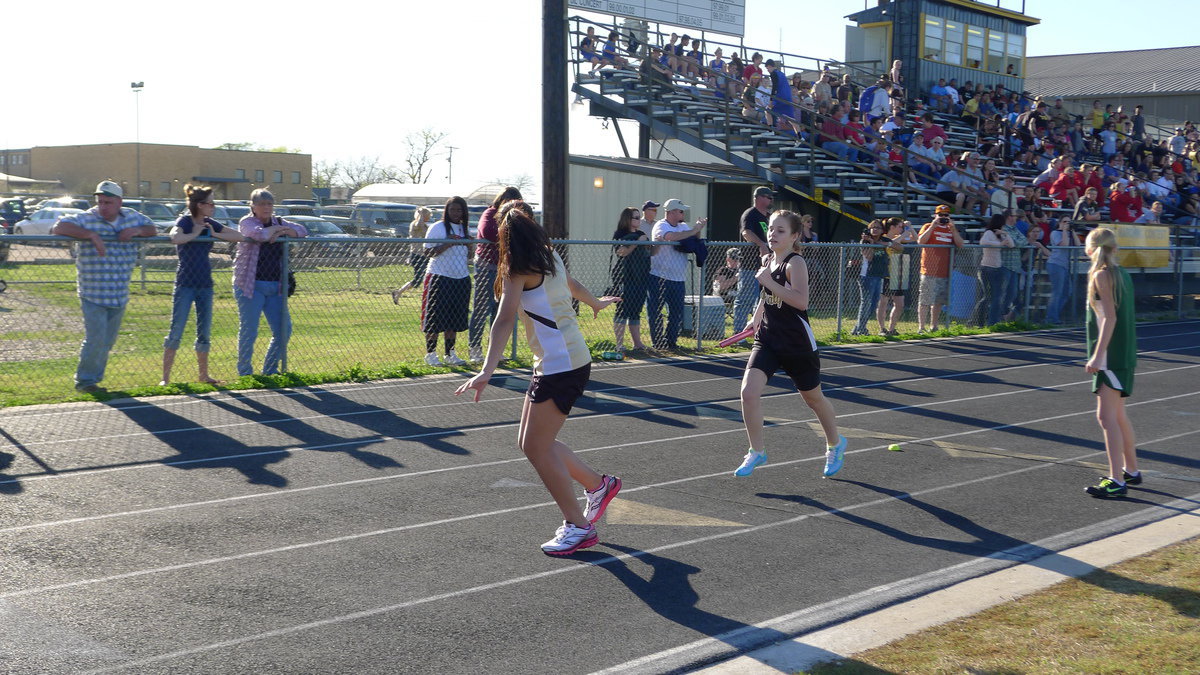 Image: Lizzy Garcia and Peyton Bowles is intent on a perfect exchange.