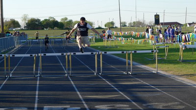 Image: High flying Joseph Celis recorded two first place wins in the 100m and 300m hurdles
