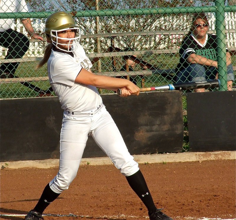 Image: Italy senior, Megan Richards(17) drives a shot into right field.