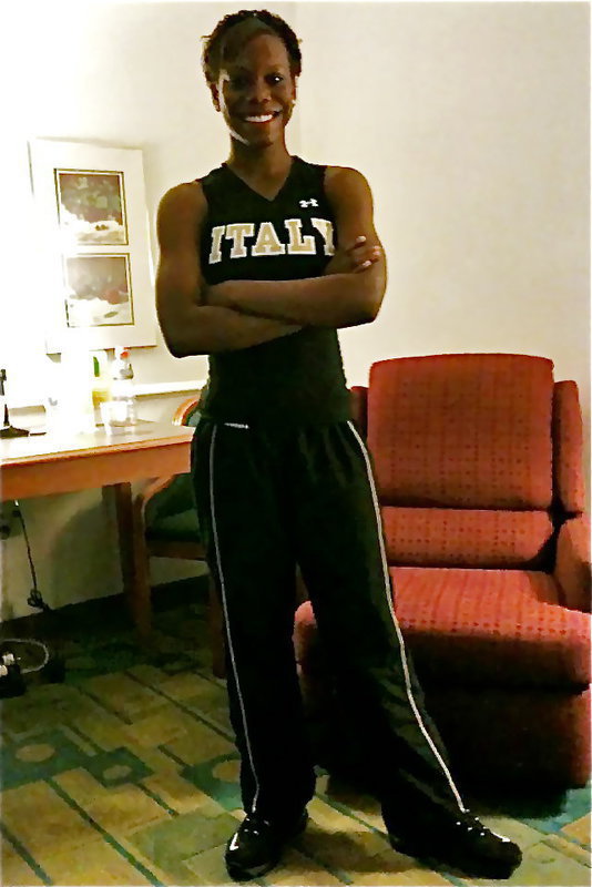 Image: Italy’s, Kortnei Johnson, poses on race day as she goes thru the paces within the solitude of her room inside the La Quinta Inns &amp; Suites in Austin.