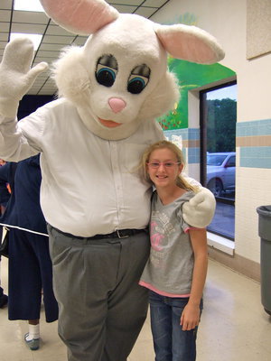 Image: Courtney Riddle and the Easter Bunny.