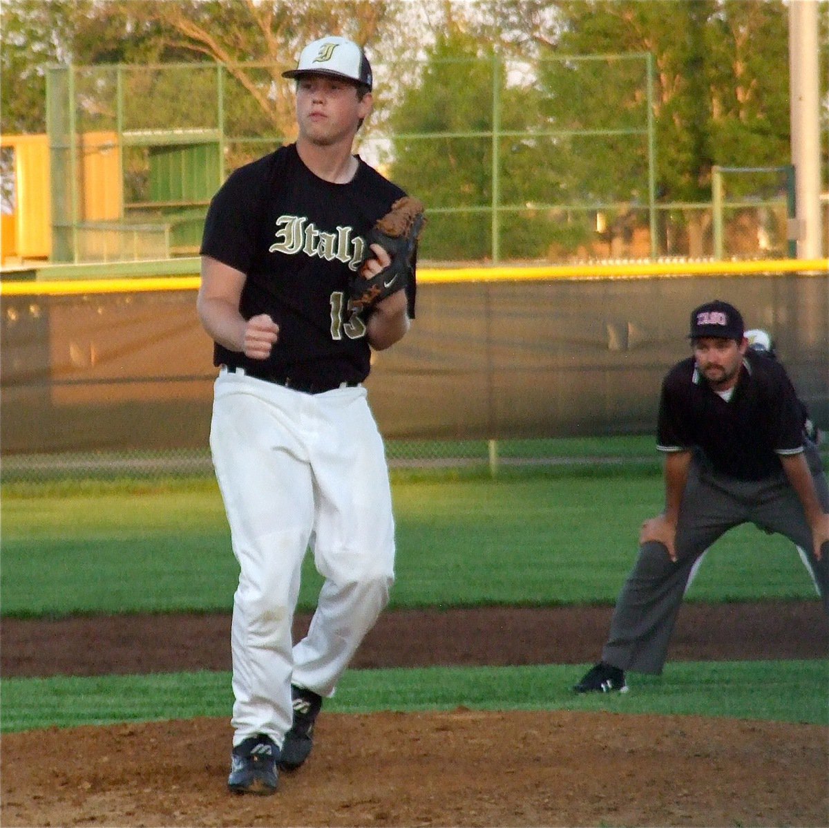 Image: Senior Gladiator pitching ace, Justin Buchanan, celebrates a strike three pitch.