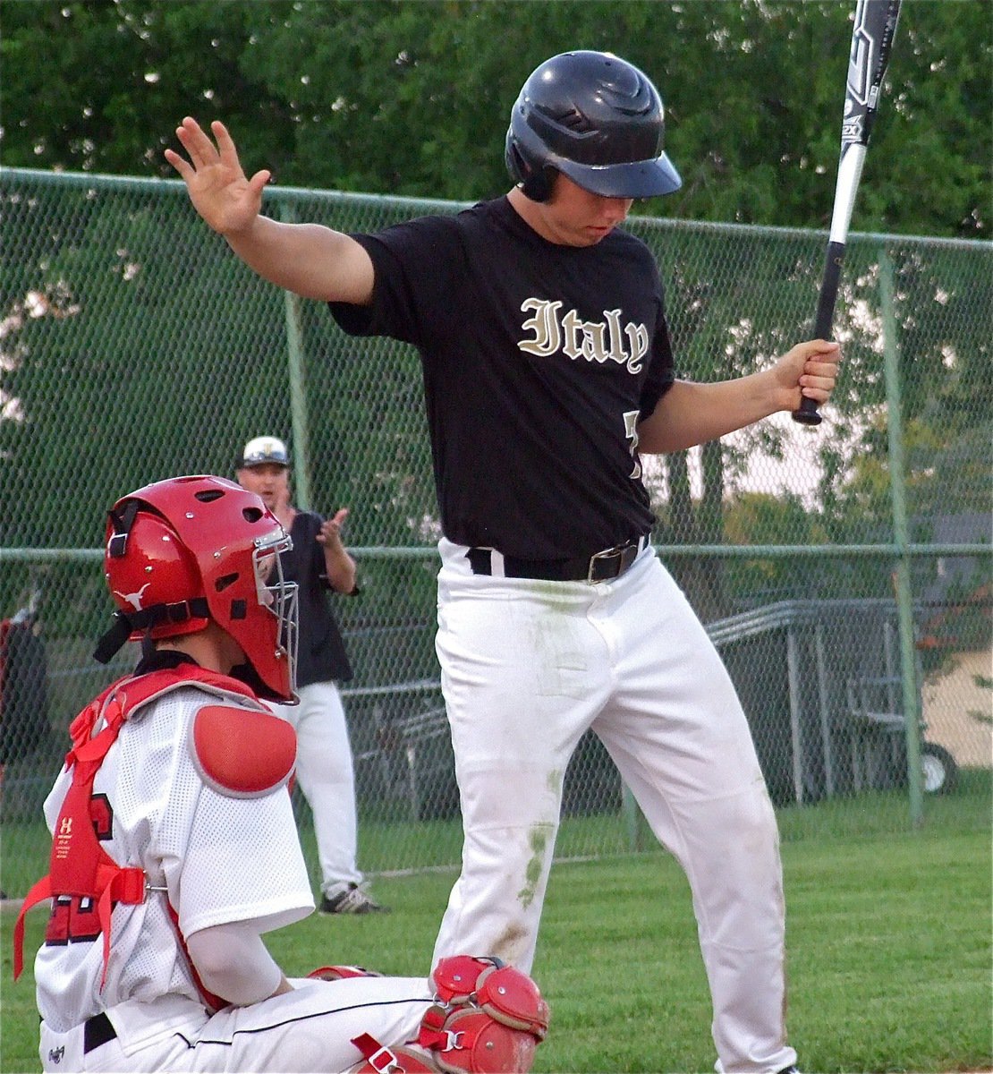 Image: Kyle Jackson(7), gives an emphatic time delay call after some misunderstanding between Jackson and the plate umpire.