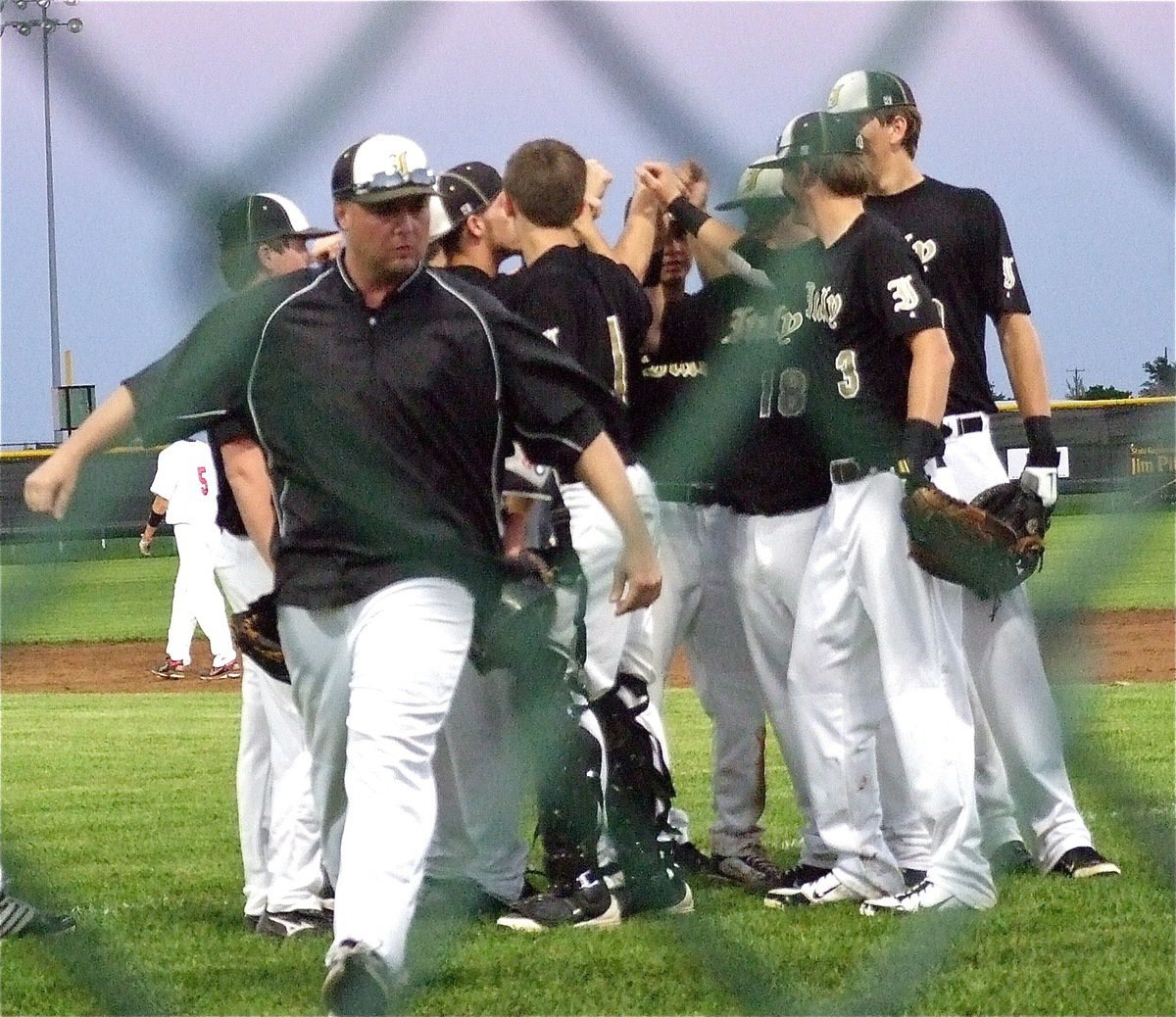 Image: Gladiator head coach, Josh Ward is pumped after huddling his troops.