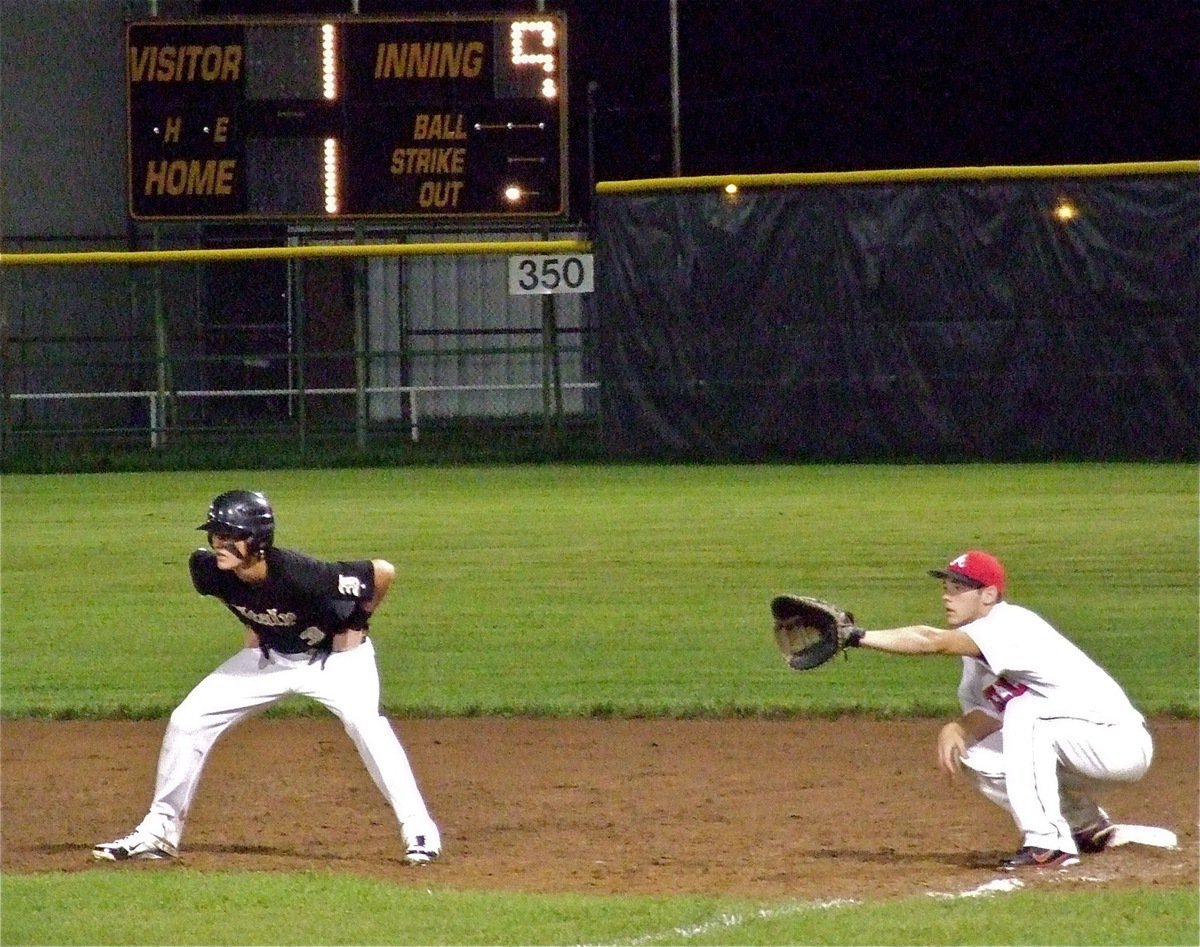 Image: Italy’s, Jase Holden(3) gets on with a single in the ninth.