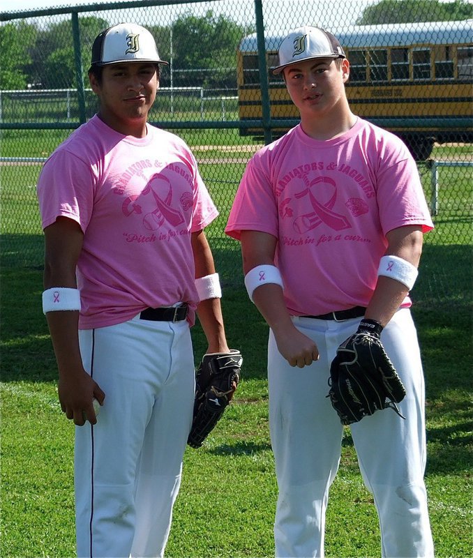Image: Italy teammates, Zain Byers and Omar Estrada, display their “Pitch in for a cure!” pink shirts.