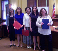 Image: Left to Right, Volunteers Kristi Jurek, Helen Kessler, Safaa Cloud, County Judge Carol Bush, Law Librarian Carla Knepper
