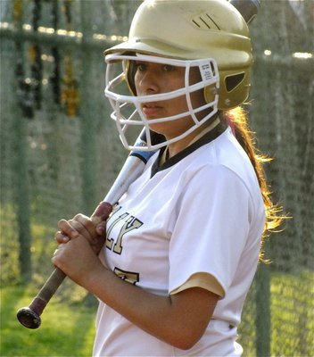 Image: Alma Suaste(7) gets ready to bat for the Lady Gladiators.