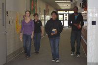 Image: Mrs. Sharon Farmer escorts the some of the journalism team members to their competition room.
(L-R) Meagan Hooker, Cruz Enriquez, Paul Harris