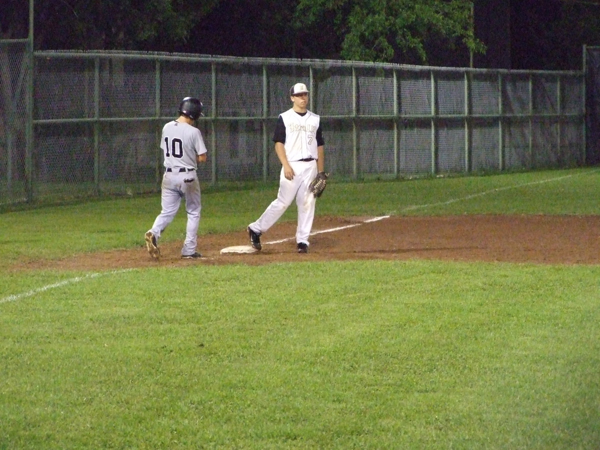 Image: Kyle Jackson covers third base.