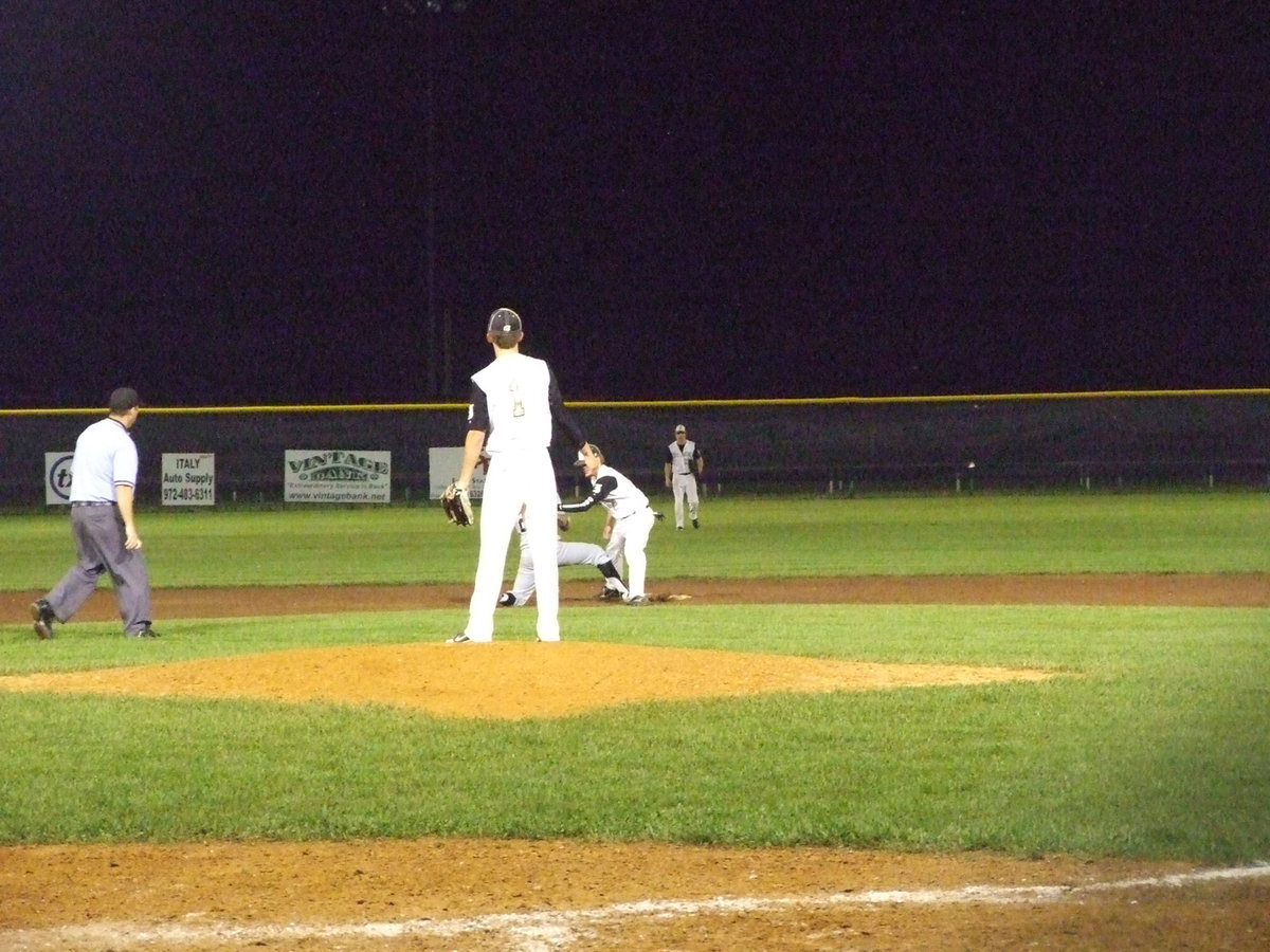 Image: Caden Jacinto gets a Zebra out at second.