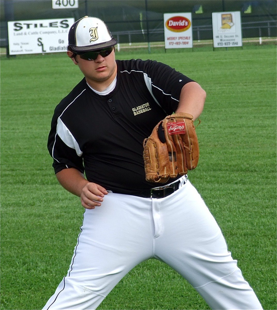 Image: JV Gladiator sophomore, Kevin Roldan uses a power stance during pre-game warmups.