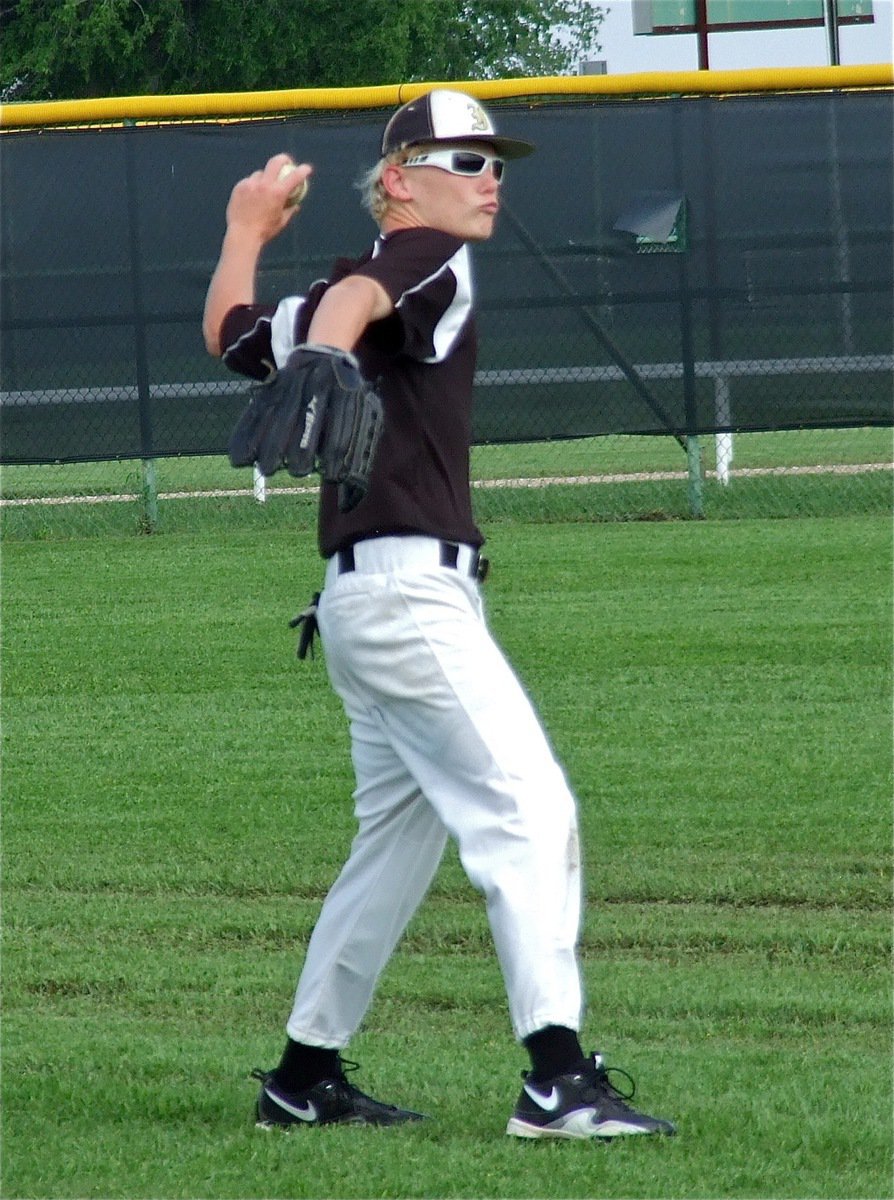 Image: JV Gladiator freshman, Cody Boyd sports his shades during the pre-game warmups.