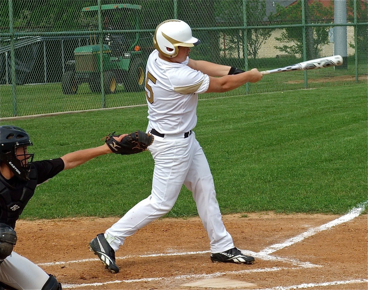 Image: Zain Byers(5) hits deep to centerfield.