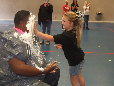 Image: Haley gently put the pie in the principle’s face.