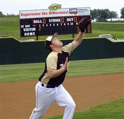 Image: Tristan Smithwick(12), catches a fly ball at thrid base for Italy’s JV squad.
