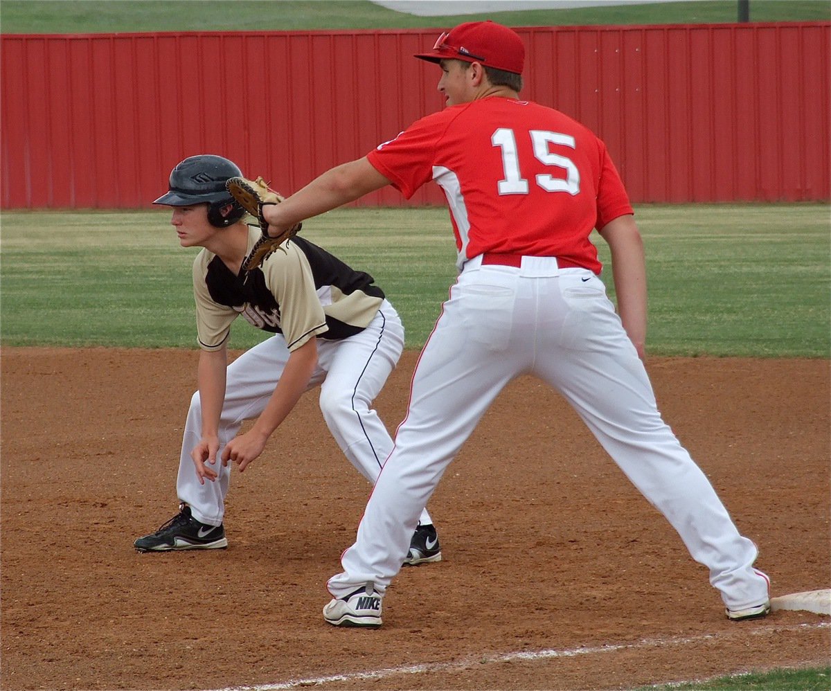 Image: Getting a lead off first base is Italy’s, Cody Boyd.