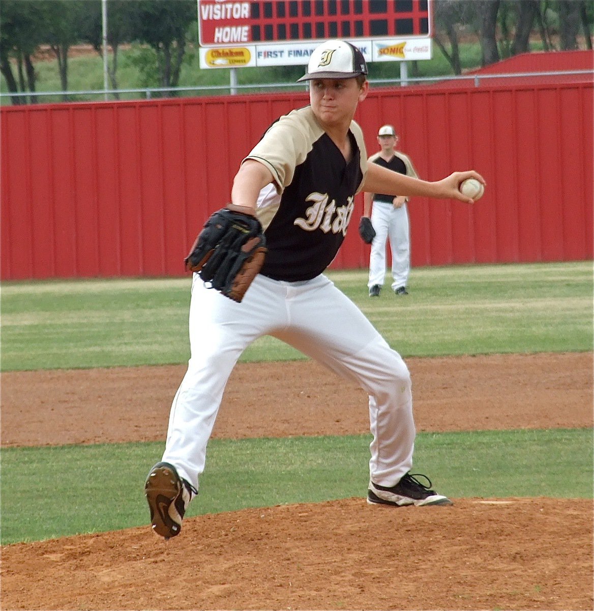 Image: Bailey Walton, eyes the catcher’s mitt of teammate, John Escamilla.