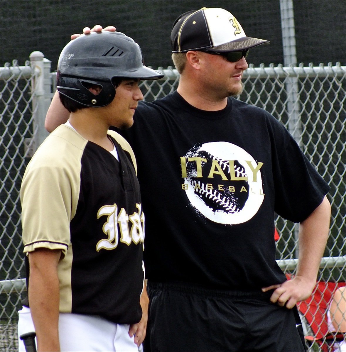 Image: Head coach, Josh Ward, gives Sophomore, Tyler Anderson, encouragement.