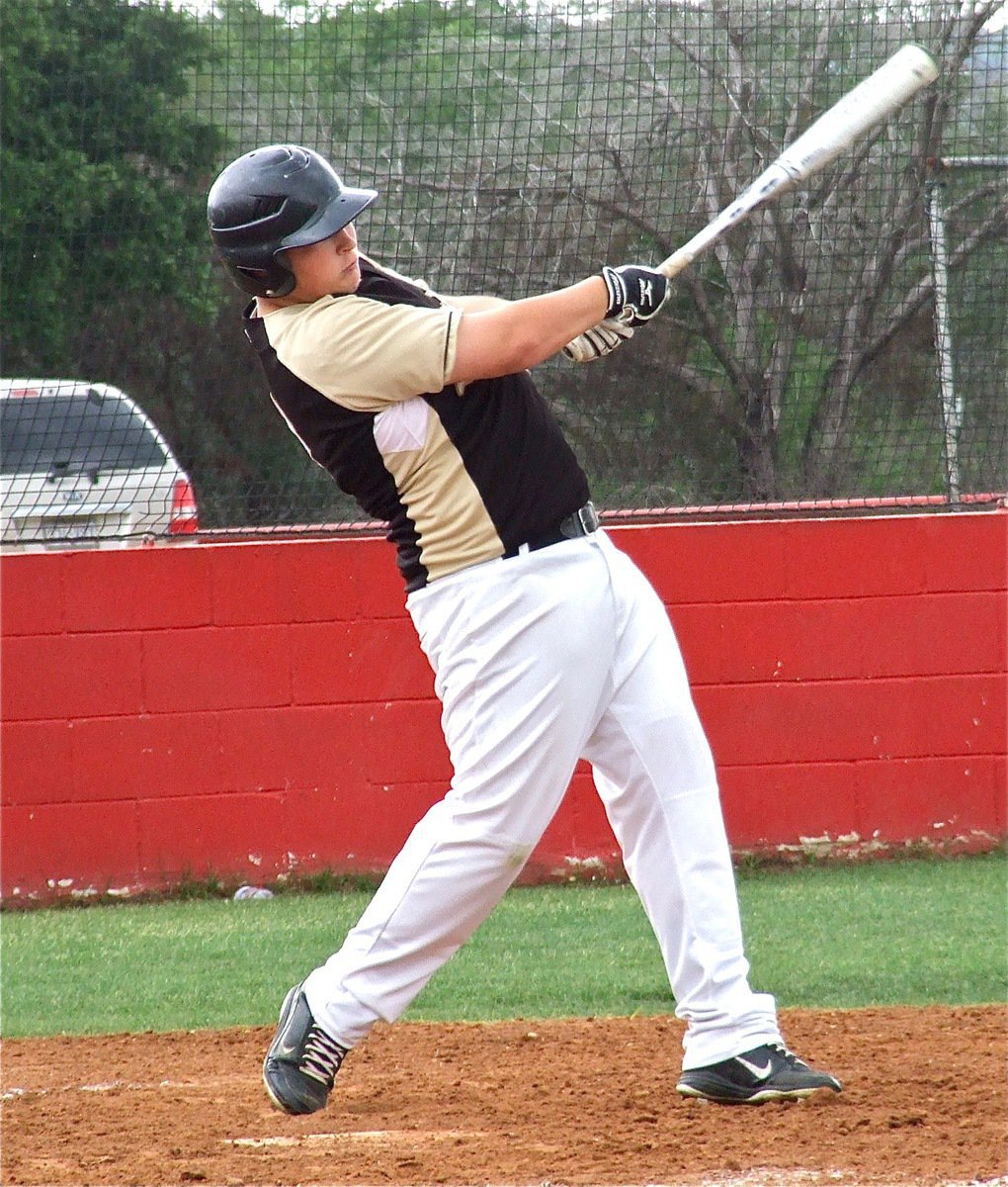 Image: Italy freshman, John Byers, gets into the swing of things airing a single during his first at bat.