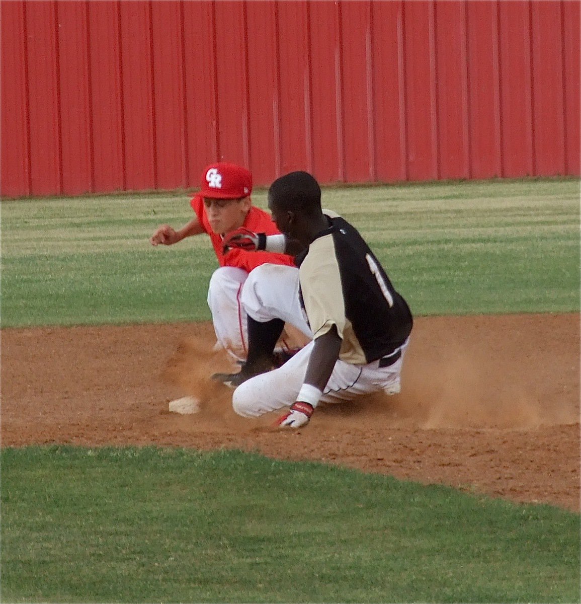 Image: Marvin Cox(1), steals second base for Italy.