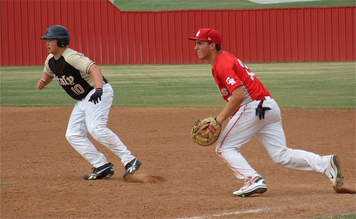 Image: Zain Byers(10), gets a lead at first base trying to give Italy an advantage.