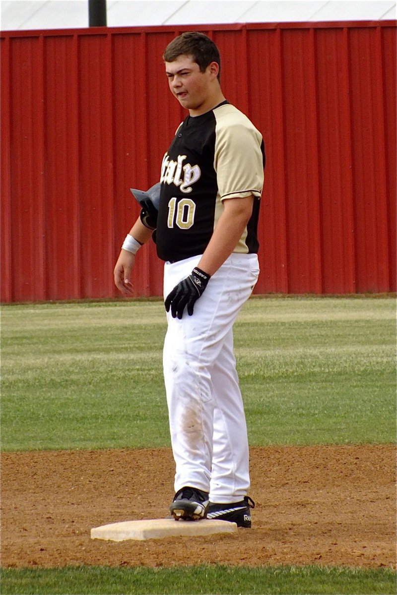 Image: Zain Byers, makes himself comfortable after hitting a double for the second time. Byers, nearly went yard twice, with both fly balls clearing 300 feet but dropping on the fair side of wall in left field.