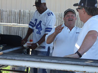 Image: Larry Eubank is helping with the successful hamburger fundraiser coordinated by Principal Joffre.