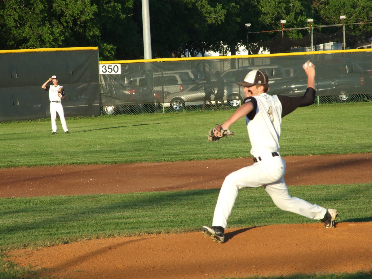 Image: Ross Stiles warms up for the game.