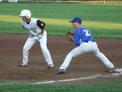 Image: Reid Jacinto waits for his opportunity to steal second.